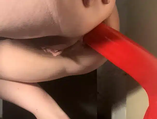 Giant red dildo in my ass